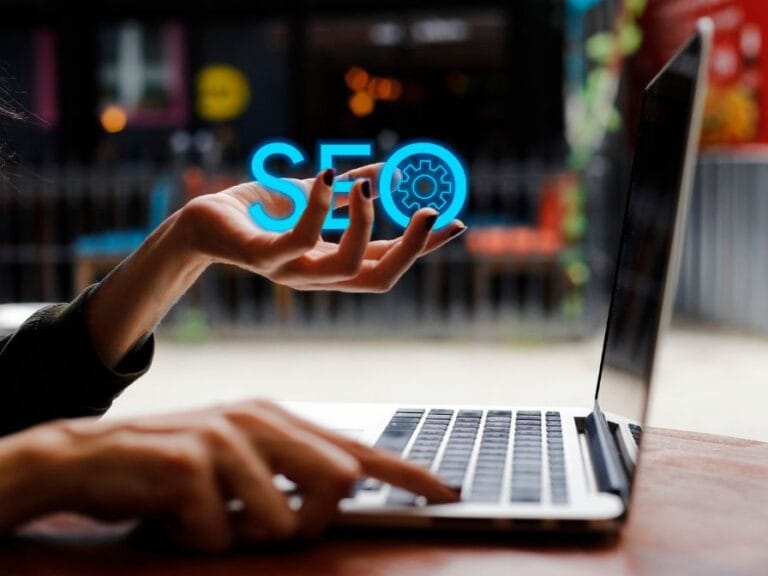 a person holding a virtual SEO logo