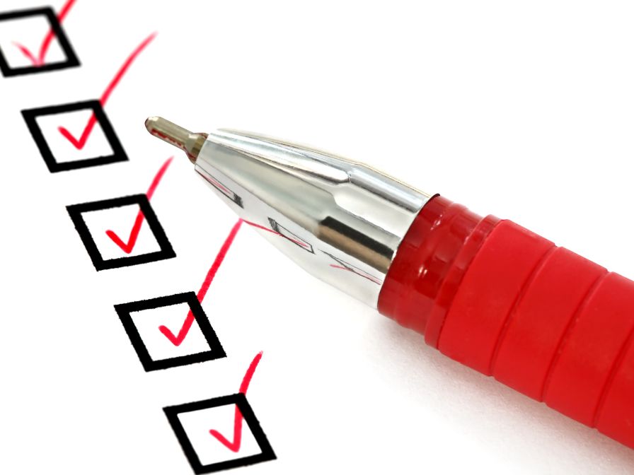 red pen and checklist red pen and checklist
