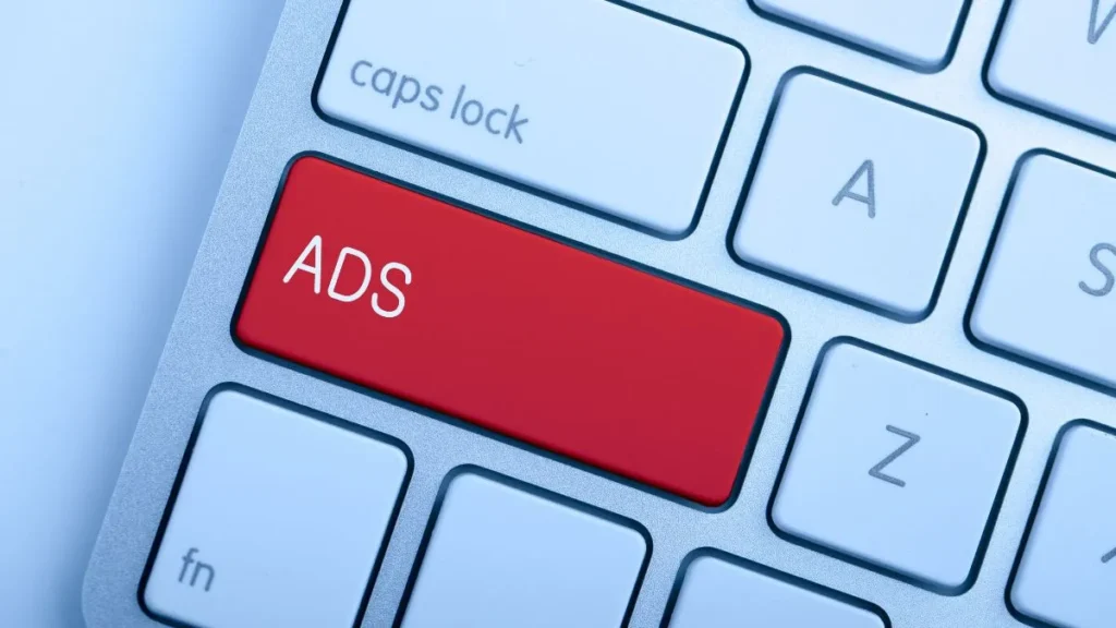 a keyboard with a key named ads
