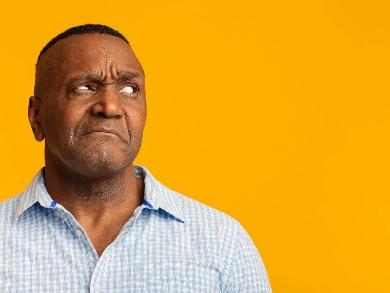 Skeptical Middle-Aged Man Looking Aside