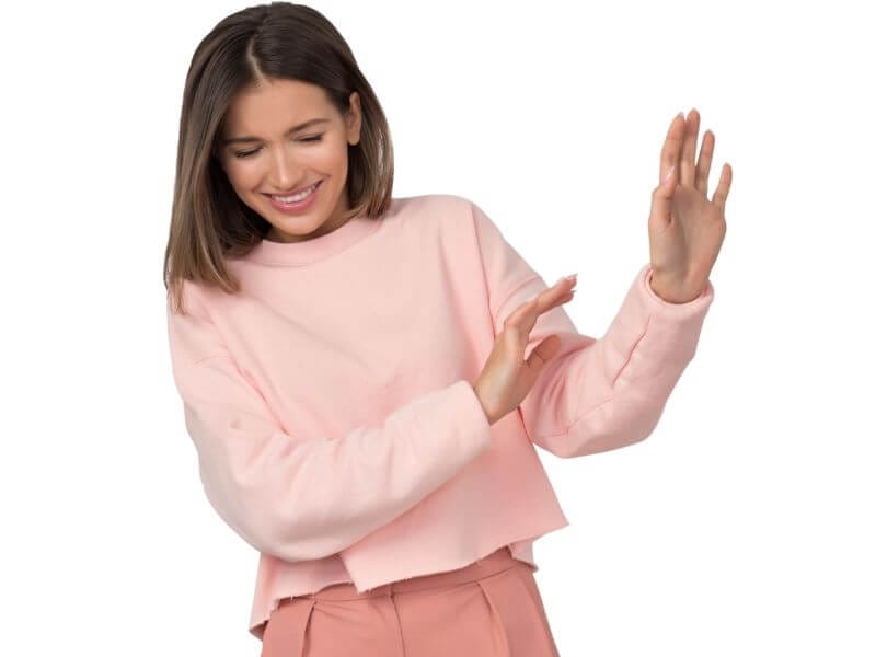 a woman avoiding something