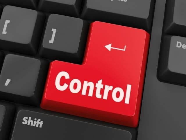 a black keyboard with red button labeled control