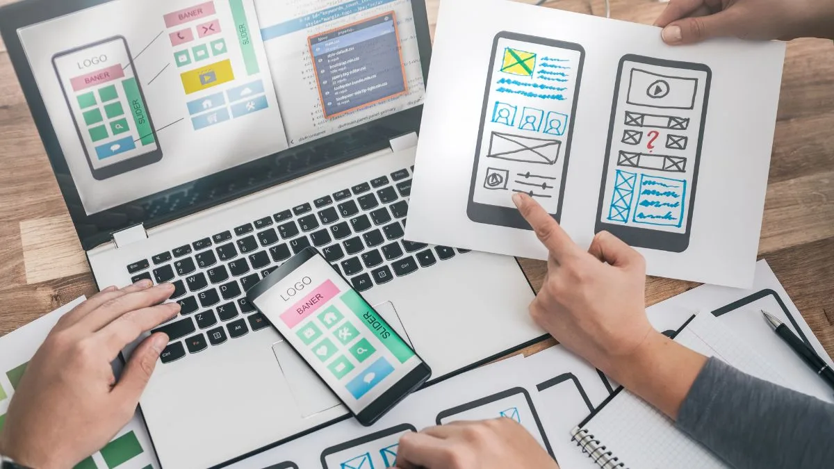 Designers working on app wireframe, which is crucial in app development