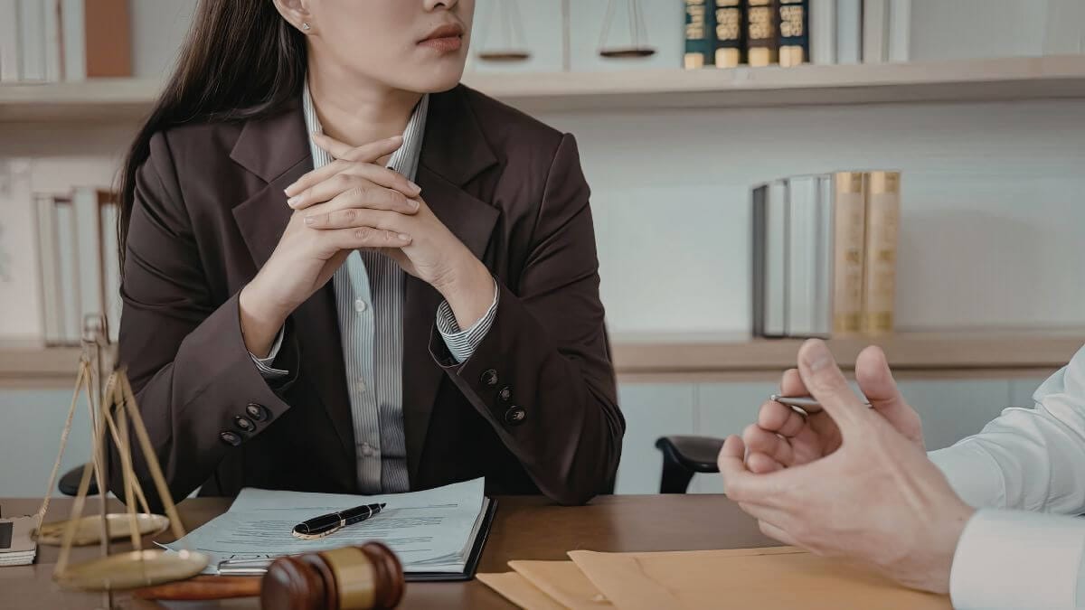 a lawyer having a conversation with her client